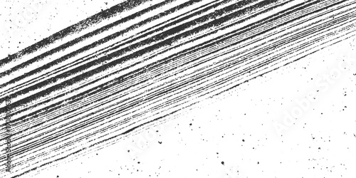 Diagonal textured black stripes on white background with scattered speckles lines