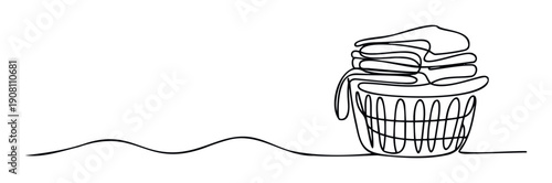 Continuous single line drawing depicting a full laundry basket with neatly folded clothes, perfect for home organization themes or domestic service advertisements