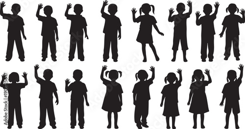 Silhouettes of people raising hands in celebration together