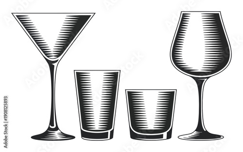 A Collection of Engraved Style Drinking Glasses: Martini, Shot, Rocks, and Wine