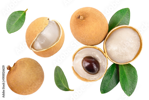 Fresh longan fruit with leaves isolated on white background. Top view. Flat lay