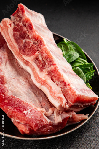 Ribs raw meat pork food preparation tasty snack fresh delicious gourmet food background on the table rustic food top view copy space