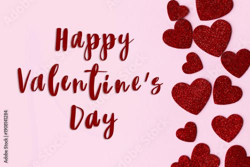 Happy valentines day greeting card. Happy Valentine's day text and  red glitter hearts on pink paper background, love banner