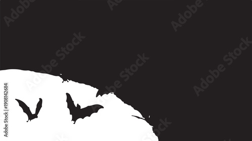 Black bats flying against a stark white background