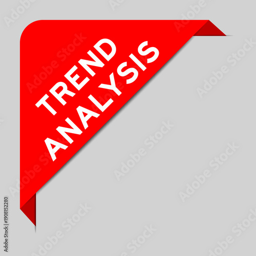 Red color of corner label banner with word trend analyssi on gray background