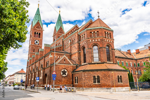 Apse of the Basilica of Our Mother of Mercy, known as the Franciscan Church, featuring its distinctive red building in Maribor’s historic center, Slovenia.