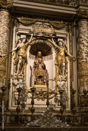 Majestic Gold Sculpture Of Virgin Mary In A Sacred Catholic Cathedral