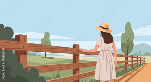 Woman in straw hat looking over wooden fence on sunny day, rural landscape