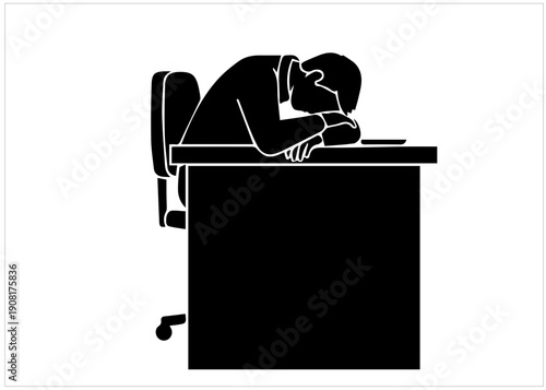 Man resting head on office desk in modern workspace