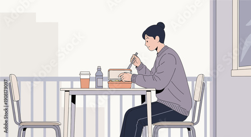 Woman eating lunch on balcony with city view