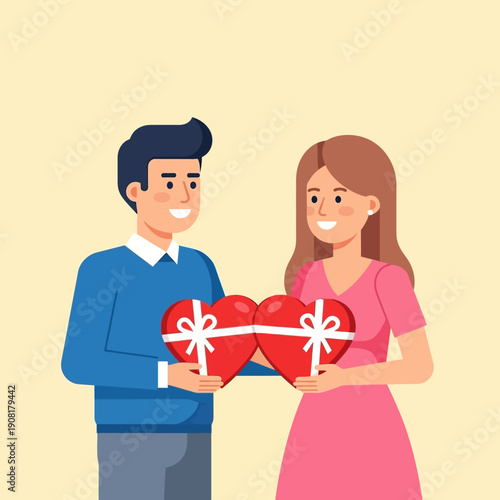 Couple sharing heart shaped gift boxes on Valentines Day.