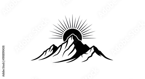 Mountain range silhouette with rising sun