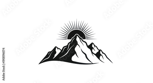 Mountain range silhouette with rising sun