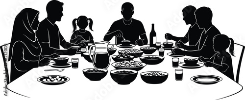Family of seven people sitting around a table filled with various dishes and drinks food