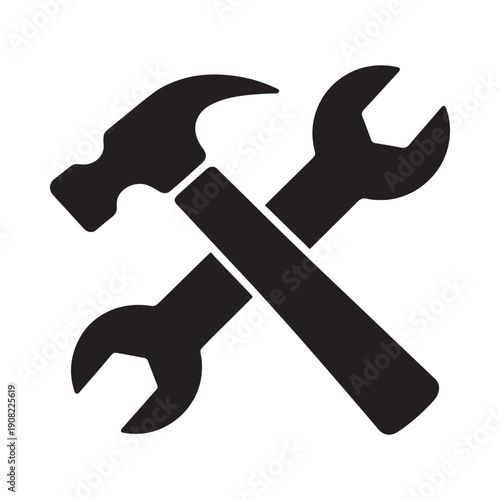 A crossed hammer and wrench tools for construction and repair