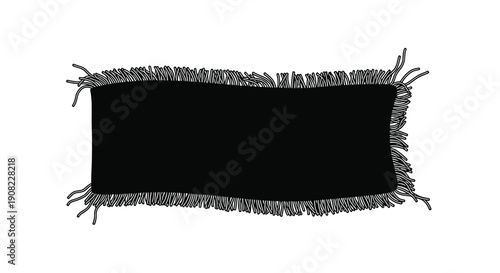 A black roughly rectangular patch with a frayed uneven border