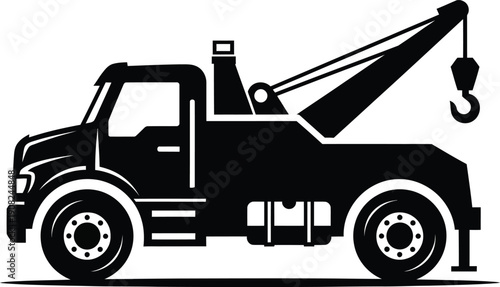 Solid black silhouette of a heavyduty wrecker tow truck with a raised crane and hook side profile view.