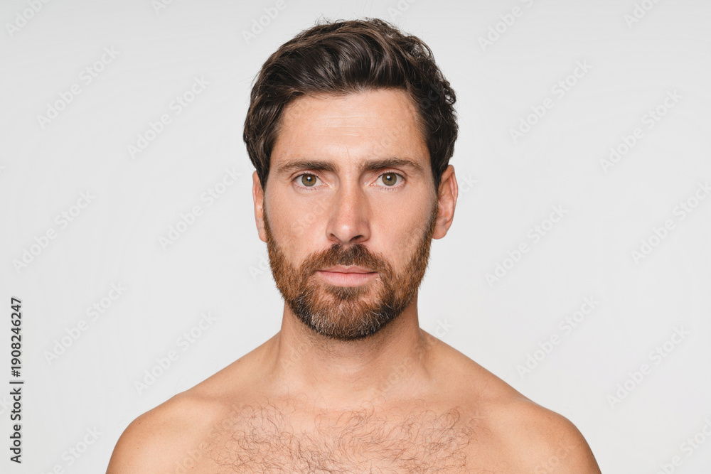 Naklejka premium Beauty, face and self care with portrait of man in studio for cleaning, salon grooming and hairstyle. Shampoo, cosmetics and aesthetic with person on background for texture and spa treatment