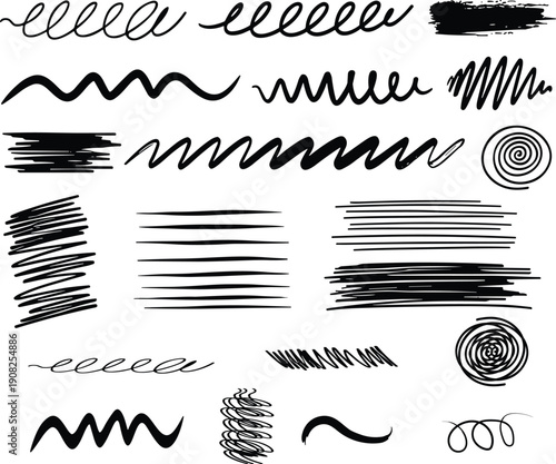 Collection of various black ink brush strokes and scribbles on white background