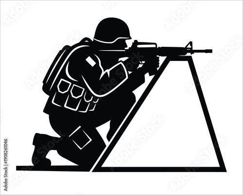 Soldier in a tactical position with a rifle