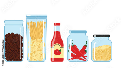 Assorted glass kitchen jars filled with coffee beans, pasta, sauce, red peppers, and grains sit neatly organized on a white surface.