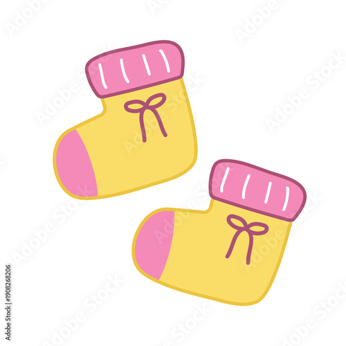 Pair of yellow baby booties with pink trim and ribbons