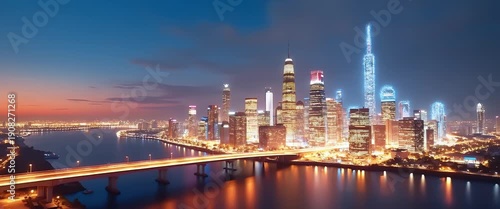 Wallpaper Mural Aerial cinematic view of a futuristic city skyline at dusk, as city lights twinkle and reflect on the river, with a slow pan capturing the vibrant urban landscape and tranquil water. Torontodigital.ca