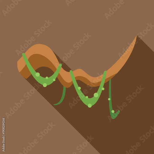 Tropical liana with green leaves hanging from a curved wooden branch