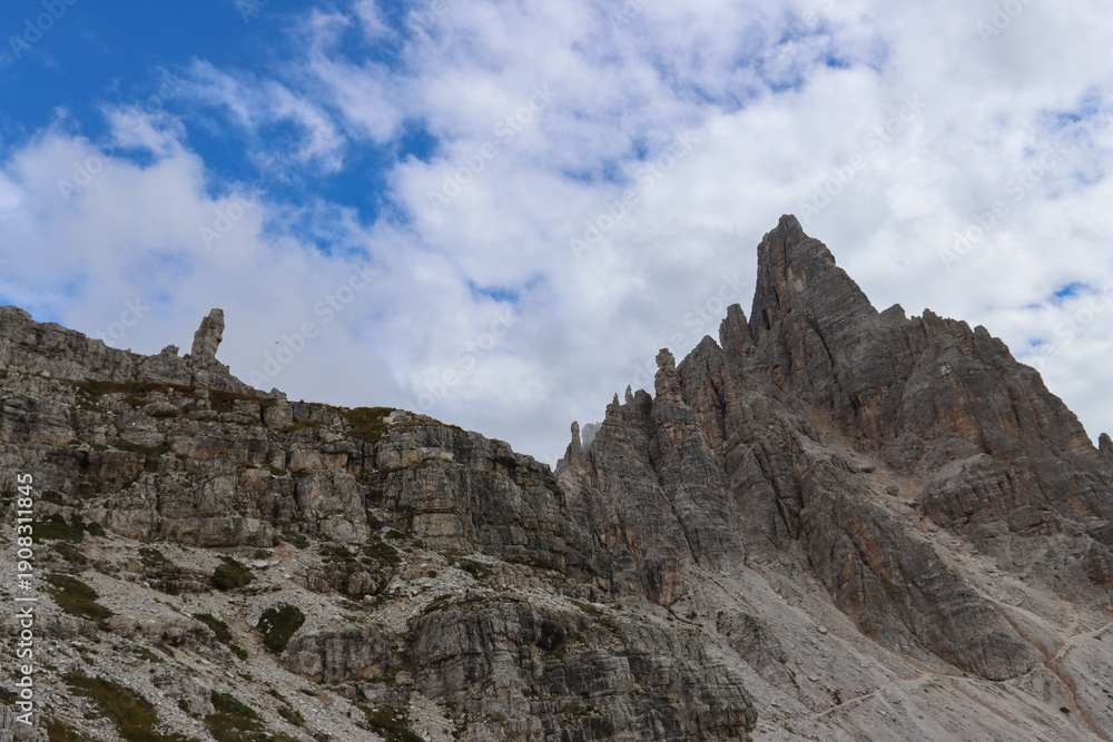 Fototapeta premium Scenic alpine landscape: Dolomites range stretching across horizon near Locatelli Hut