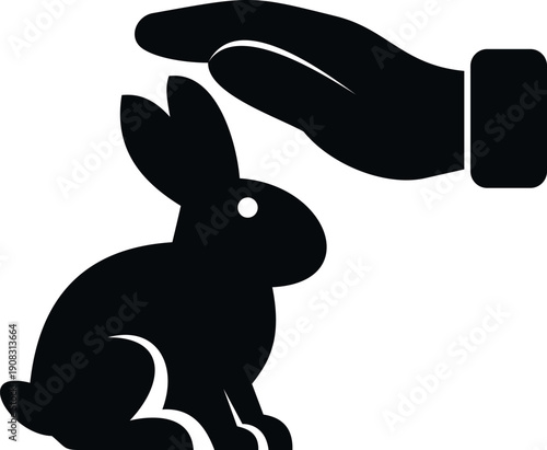 Human hand illustrating protection and care for a rabbit, representing animal welfare