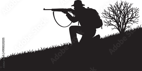 Silhouette of a hunter in a hat with a backpack aiming a rifle while kneeling on a grassy hill next to a bare tree also transparent background