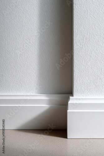 White Wall with Shadow and Baseboard for Home Interior Design Concept
