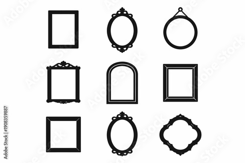 Collection of various black picture frames with ornate designs and shapes