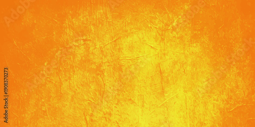 An abstract vintage backdrop featuring a textured grunge design of orange and yellow paint on aged parchment paper with a stained antique wall pattern