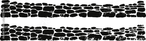 two rustic stone walls with irregular black stone patterns in horizontal alignment