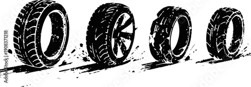 Four black tires with different tread patterns rolling on a white surface