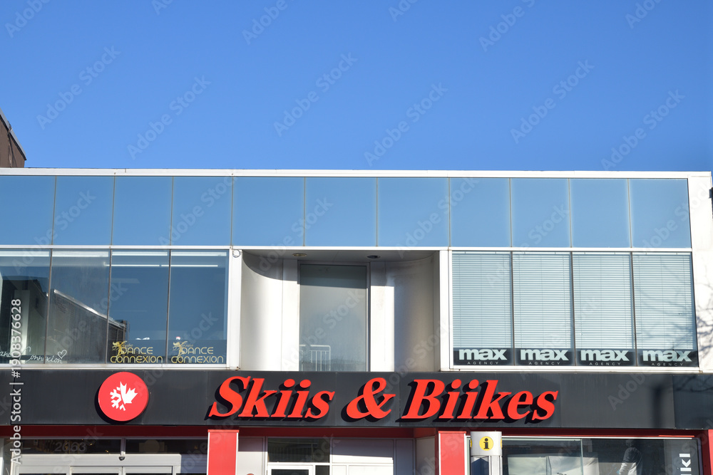 Fototapeta premium abstract building facade and sign of Skiis & Biikes, a ski and bike shop, located on the east side of 2063 Yonge St, Toronto