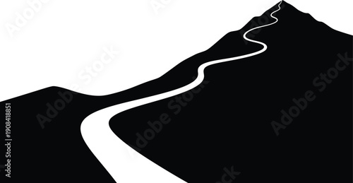 Serpentine road ascending a majestic mountain peak