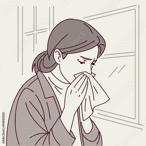 Woman blowing nose into tissue with closed eyes and frowning