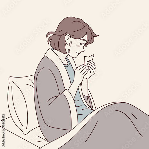 Woman sitting in bed with runny nose blowing nose sick