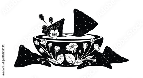A decorative bowl filled with tortilla chips and floral elements presented as a striking black silhouette high quality