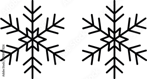 Two black snowflakes on a white background winter cold