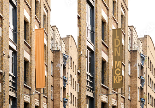 Real photo of big vertical fly banner in London. PSD template Mockup.
