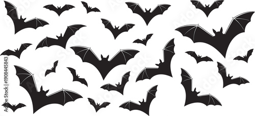 "A stylish young South Asian man wearing a crimson oversized COOL graphic t-shirt and black pants sitting casually on a metal railing in a sunny park"