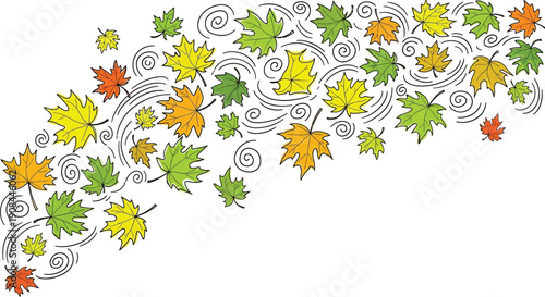 Autumn leaves are carried by the wind in a swirling motion.