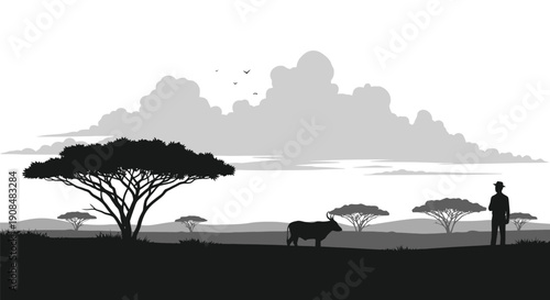 African savanna landscape with silhouetted trees wildlife and a person