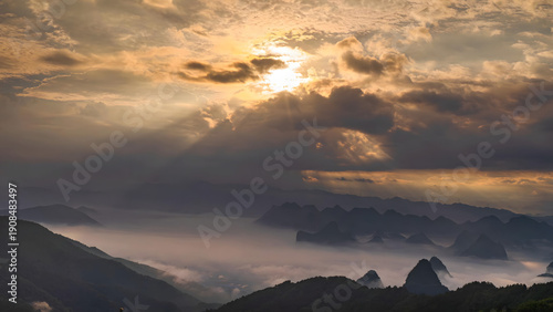 Fényképezés Guilin Mountains at Sunset with Dramatic Sky and Misty Valleys