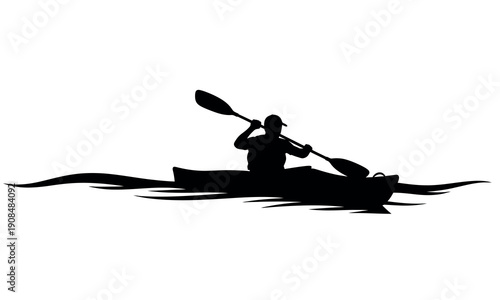 Kayaker paddling on calm water silhouette