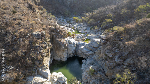 Tableau sur toile Aerial view of Waterfall and Turquoise Pool in Cañón de la Zorra, Sierra de la L