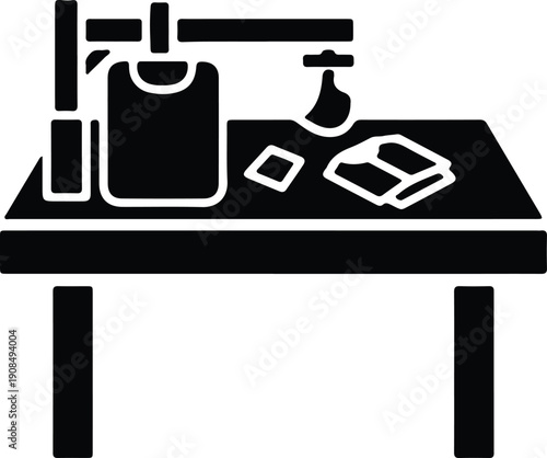 silhouette of sewing machine table with fabric and tools vector design